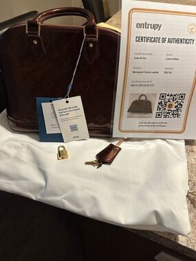 Louis Vuitton Vernis Alma PM in Deep Bordeaux with Gold Hardware